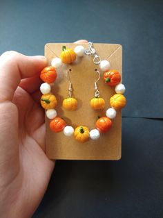 Each pumpkin bead is handmade and unique, just like a real pumpkin! This gives each bracelet character and charm. Bracelets are fitted with adjustable lobster clasp so they can fit most wrists! This bracelet adjusts from 7-9 inches. Earrings are lightweight and hypoallergenic. *As this item is completely handmade, and I am still learning, there may be imperfections in the clay. Pearl Halloween, Pumpkin Bracelet, I Am Still Learning, Bracelet And Earring Set, Pumpkin Bead, Fall Accessories, Halloween Jewelry, Thanksgiving Gifts, Accessories For Women