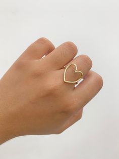 -14k Heart Ring  -100% Gold  -Size 7  -Yellow gold  -Item sold by piece.Weight undetermined. Yellow Gold Open Heart Wedding Ring, Valentine's Day Hallmarked Heart Ring, Yellow Gold Heart Cut Heart Ring For Gift, Yellow Gold Heart Cut Ring For Gift, Heart-shaped 14k Promise Ring, Heart Shaped Promise Rings Stamped 14k, Gold Open Heart Ring Gift, Gold 14k Heart Ring In Fine Jewelry Style, Gold Heart Rings For Gift