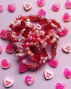 💖Fun & funky Valentine's theme bracelets 💓Each bracelet comes with a Loveheart sweets glittery Hug Me heart charm  💝Whether they're matching Mummy & Daughter, made to include your loved ones names or Galentines to show your besties how much you love them  ❤️🔥Come in Toddler (3-5years), Child (6-13years) & Adult (Age14+) sizes 💗Adult bracelets can be made in any size requested, just add a note with your order or pop me a message with your required measurement/s in CM, if not all adult size b Personalized Pink Novelty Charm Bracelet, Whimsical Red Jewelry For Valentine's Day, Personalized Pink Novelty Bracelets, Personalized Pink Charm Bracelet, Fun Pink Heart-shaped Jewelry, Cute Heart Beaded Bracelets For Valentine's Day, Cute Heart Beads Beaded Bracelets For Valentine's Day, Friendship Letter Bead Charm Bracelet For Valentine's Day, Pink Letter Beads Jewelry For Party