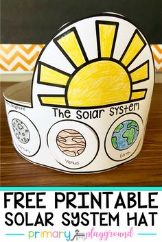 a paper plate with the solar system on it and text that reads free printable solar system hat