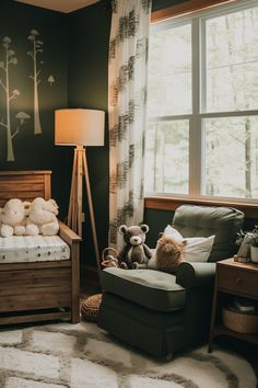 a teddy bear sitting in a chair next to a window