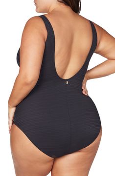 Stay comfortably and stylishly covered in this one-piece swimsuit designed with a quick-drying textured fabric supportive power-mesh lining. Moderate back coverage 90% nylon, 10% elastane Hand wash, dry flat Imported Solid Swimwear With Built-in Padding For Beach, Black Polyamide Bodysuit For The Beach, Stretch Beachwear Swimwear With Back Closure, Sleeveless Solid Swimwear With Built-in Padding, Solid Sleeveless Swimwear With Built-in Padding, Lined Polyamide Swimwear For Beach, Black Polyamide Swimwear For Sports, Nylon Swimwear With Built-in Padding For Beach, Black Polyamide Sports Swimwear