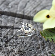 Hibiscus Flower Ring details: -Solid .925 sterling silver -Hibiscus measures approx. 13x11mm -Smooth ring band measures 1.2mm wide -Comfortable and easily stackable! -Available in US sizes 1-11 with half sizes.  *Hibiscus Stacking Ring set shown here: https://www.etsy.com/listing/832812414/hibiscus-ring-hawaiian-hibiscus-ring?ref=shop_home_active_1&frs=1 Looking for a last minute or unique Christmas gift? Visit our "READY TO SHIP" section here, ships out in one business day https://www.etsy.com/ Surf Jewelry, Silver Flower Ring, Hawaiian Jewelry, Unique Christmas Gift, Stacking Ring Set, Diamond Bridal Sets, Hibiscus Flower, Jewelry Lookbook, Unique Christmas Gifts