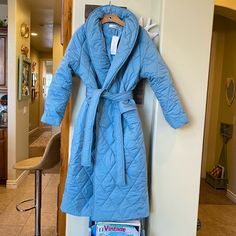 Nwt Kaleirda Baby Blue Quilted Longline Puffer Jacket Coat This Coat Is Amazing!! So Warm And Cozy From Head To Toe Beautiful Robins Egg Blue Pockets Quilted Strap Luxury Puffer Quilted Pattern Size Large Measurements Underarm To Underarm 25” Laid Out Flat Length 45” Shoulder To Shoulder 21” There’s Not A Set Point To The Shoulders So Could Fit Larger As Well Puffer Coat With Fur, Brown Puffer Jacket, Grey Puffer Jacket, Pink Puffer Coat, Faux Fur Hooded Jacket, Grey Puffer, Black Puffer Coat, Winter Puffer Jackets, Fur Hood Coat