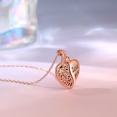 This photo necklace is perfect for making memories last forever. Don't miss this romantic and delicate piece! Unique, special and beautiful, this heart locket necklace is cleverly designed with one half engraved with "Love You" and one half designed as a floral totem. The necklace is crafted in sterling silver with stunning detailing, and with the addition of your own photo, this beautiful piece will be even more memorable.Weight: 4.9 gWidth: 17.6 mmHeight: 23.9 mmThickness: 5.1 mmMaterial: 925 Heart Pendant Necklace With Engraving Option For Wedding, Open Heart Charms Necklace For Wedding, Dainty Rose Gold Locket Necklace For Anniversary, Wedding Open Heart Charms Necklace, Rose Gold Charm Necklaces For Anniversary Gift, Rose Gold Necklaces With Charms For Anniversary, Heart Shaped Wedding Necklace With Engraving Option, Heart Cut Charms Necklace For Wedding, Rose Gold Charms Necklace For Anniversary Gift