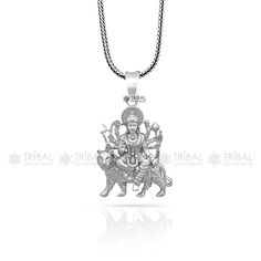 Divine 92.5 sterling silver Indian Hindu Idols Blessing Goddess Bhawani/Durga/Santoshi maa with lion vintage antique style stunning divine pendant, best gifting unisex jewelry from India. Metal-925 sterling silver. Item type-Pendant/ Locket Weight-2.60 grams. Height-2.7 centimetre. Width-1.5 centimetres. Stamped-925. Chain details:(if buyer want to purchase) Chain width-1.5mm(if buy) Weight-12.500 to 18.500 grams(weight vary as per length) Chain Type-screw chain/ pendant chain. Durga Maa Pendant, Sterling Silver Amulet Necklaces For Puja, Sterling Silver Pendant For Puja, Navratri Temple Jewelry In Sterling Silver, Antique Silver Spiritual Pendant Necklace, Hippy Gifts, Unisex Jewelry, Chain Pendants, Antique Style