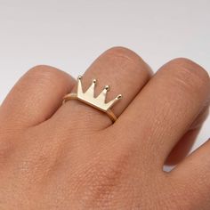 "Shiny Crown Ring Real 10K Yellow Gold * Metal : Real 10K Yellow Gold (Properly Stamped, 10K) * Condition : Brand New * Finish : Polished * Average Weight : 2.53 grams * Size : 6 * Width : 8.5mm x 15.5mm = Just over 1/4\" x 5/8\" * Clasp/Bail : Can be resized down or up at your local jeweler All of our items are brand new and are shipped with a gift box." 14k Gold Crown Design Diamond Ring, Gold Crown Design Diamond Ring In 14k Gold, Gold Diamond Ring With Crown Design In 14k, Crown Shaped 14k Yellow Gold Jewelry, 14k Gold Crown Design Fine Jewelry, Gold Ring With Crown Design For Anniversary, Anniversary Crown Shaped 14k Gold Ring, Classic Gold Rings With Crown Design, 14k Gold Crown Design Jewelry As A Gift