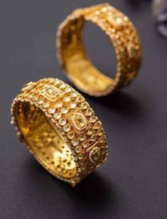 *This is Gold Finish Kundan Bangles Pair.Its Perfect for Wedding Occasion as well as Unique and Ethnic Traditional Bangle to gift and Also Bridal wear to match with Wedding Outfits. *Its made from Silver n Copper mix material and 100% Handmade. *Its available in Various Sizes like 2,2.2,2.4,2.6 Etc Its white kundan combination like shown in picture. *Its open able Screwed Bangles Pair. *All Kundan stones set with silver foils handsetting method and long last guarantee of its workmanship.It is Wh Gold Bracelet Jewelry For Wedding, Gold Wedding Jewelry With Cutdana, Gold Wedding Bracelet Jewelry, Heavy Kundan Bangle For Wedding, Kundan Cutdana Bangle For Wedding, Cutdana Kundan Bangle For Wedding, Traditional Hand Set Bangle For Wedding, Gold Bridal Accessories With Stone Work For Wedding, Gold Bridal Accessories With Intricate Design For Marriage