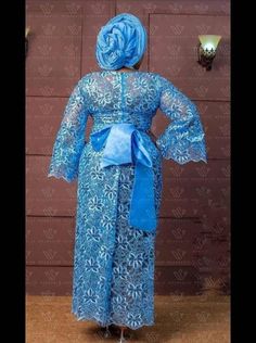 Iro and buba Elegant Formal Dresses With Traditional Patterns, Elegant Blue Gown With Traditional Drape, Floor-length Wedding Gown With Traditional Patterns, Traditional Pattern Floor-length Wedding Gown, Traditional Patterned Floor-length Wedding Gown, Elegant Blue Gown For Ceremony, Traditional Pattern Floor-length Sets For Wedding, Traditional Pattern Floor-length Wedding Sets, Elegant Wedding Gown With Traditional Patterns