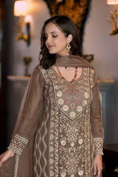 This Suit is a suitable amalgamation of style and grace that is required from ethnic wear. The dress is ideal for any formal or informal gathering. Crafted with the utmost care, our plazzo suits are made from high-quality fabrics that offer comfort and breathability, allowing you to move effortlessly. The highlight of our salwar suit, is meticulously designed to enhance your beauty. It comes in a range of stunning styles, catering to diverse occasions and preferences. Chest Size: Medium: 38 Inch Elegant Long Sleeve Sharara For Navratri, Traditional Floor-length Formal Salwar Kameez, Elegant Chikankari Embroidery Palazzo Set For Navratri, Transitional Long Sleeve Georgette Palazzo Set, Formal Anarkali Lawn Suit In Georgette, Festive Brown Chanderi Kurta, Formal Semi-stitched Dabka Anarkali Set, Formal Georgette Salwar Kameez With Dabka, Formal Semi-stitched Anarkali Set With Dabka