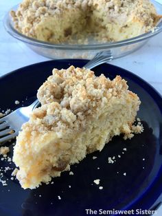 a blue plate topped with a piece of cake