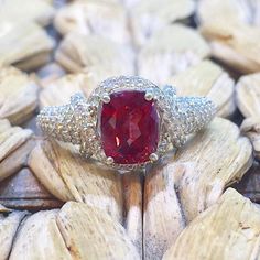 Luxury Ruby Jewelry With Pave Setting, Red Diamond Fine Jewelry Gemstones, Fine Jewelry Red Diamond Gemstones, Red Diamond Gemstones For Fine Jewelry, Classic Ruby Ring With Pave Setting For Anniversary, Formal Red Diamond Ring With Pave Setting, Red Ruby Ring With Diamond Accents, Cushion Cut Diamond Fine Jewelry, Dazzling Ruby Ring With Diamond Accents