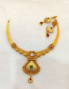 22k Real Gold Necklace Set with Gold Earrings-Antique Gold Necklace- Indian Gold Necklace- wedding Gift-Solid Gold Necklace- Gold jewellery  This is beautifully handmade Antique 22k Solid Gold Necklace along with the real gold Earrings designed in Antique theme with the touch of gemstones that gives it aesthetic look and enhances your beauty! PRODUCT SPECIFICATIONS: Material: 22k Solid Gold Weight: 42 grams approx  Design: Antique  Customer satisfaction is our utmost priority, feel free to have any query, would love to assist you! We accept custom orders as well! Jai Shree Shyam 🙏🙏 Happy Shopping 🛍️ Ganga Jamuna Gold Necklace, Goan Gold Necklace, 30 Grams Gold Necklace Indian Set, Luxury Yellow Gold Necklace For Puja, 22k Gold Dual-tone Jewelry For Wedding, Gold Jhumkas For Marriage And Festive Occasions, Festive Gold Jhumkas For Marriage, Traditional Gold Jhumkas For Marriage, Dual-tone 22k Gold Wedding Jewelry