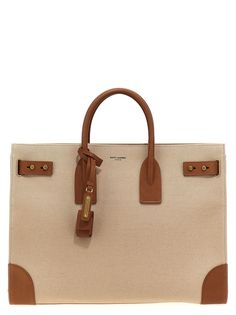 saint-laurent-sac-de-jour-large-handbag-1725038991252857197-0 Designer Canvas Bag With Top Handle, Designer Brown Canvas Bag With Top Handle, Designer Rectangular Canvas Travel Bag, Designer Canvas Bag With Detachable Handle For Travel, Designer Tote Briefcase With Gold-tone Hardware, Designer Canvas Travel Bag With Top Handle, Designer Top Handle Canvas Bag For Travel, Designer Travel Canvas Bag With Top Handle, Luxury Canvas Bag With Top Handle