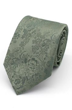 a green floral tie on a white background