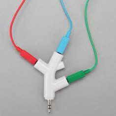 an iphone screenshot of a white and green cord with red, blue, and green wires attached to it