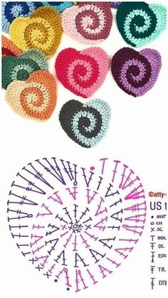 crocheted hearts are arranged in the shape of a ferris wheel with numbers on each side