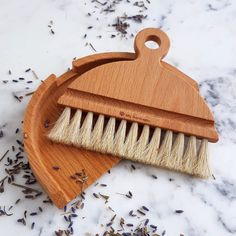 This mini beechwood-and-horsehair broom set is perfect for cleaning small messes, such as desktop crumbs, and it nests together for easy storage. Desktop Table, Swedish Traditions, Iris Hantverk, Chinese Money Plant, Best Housewarming Gifts, Dust Pan, Housewarming Gifts, Horse Hair