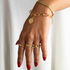 "Gold Chain Ring, Gold Stacking Ring, Thick Chain Ring, Curb Chain Ring, Statement Ring, Cuban Link Ring, Cuban Chain Ring, Minimalist Ring ★1 YEAR WARRANTY★ Our products are plated with a thick layer of 14k solid gold on sterling silver (925K) silver, made with a special technique called \"vermeil\". All our jewelries are guaranteed for one year against tarnishing and deterioration. Provided that they are protected from water, soap and chemicals, they can be used for many years with their first Luxury Gold Chain Ring With Polished Finish, Luxury Gold Chain Ring With Timeless Style, Luxury Chain Ring For Women, Luxury Yellow Gold Chain Ring For Gift, Luxury Gold Chain Ring, Luxury Elegant Chain Ring For Women, Luxury Yellow Gold Chain Ring Gift, Luxury Gold Promise Ring Chain, Cuban Chain Link Ring