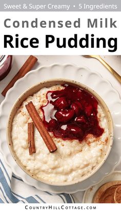 a bowl of rice pudding with cinnamon sticks on top