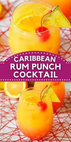 two glasses filled with rum punch and garnished with pineapple