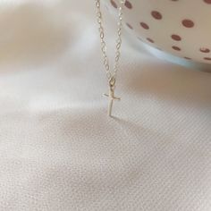 "Minimal, Elegant Cross Necklace. Looking for: -a Dainty Cross Necklace for protection -a Feminine Elegant Cross Necklace for every day wear or - a unique delicate gift to your sister or daughter Whatever the reason may be, this Delicate Cross is perfect for every occasion. This Religious pendant is the PERFECT GIFT for every Woman. So delicate and feminine. We use only HIGH QUALITY materials and offer guarantee on our necklaces. We are a 5-Star Seller. Check our reviews and see what our custome Dainty Cross Necklace For Everyday Wear, Minimalist Hypoallergenic Cross Jewelry, Simple Charm Necklaces For Mother's Day, Minimalist Cross Pendant Jewelry Gift, Minimalist Tiny Charm Necklaces For Mother's Day, Minimalist Cross Pendant Necklace As Gift, Minimalist Cross Pendant Necklace For Everyday, Minimalist Cross Charm Necklace With Delicate Chain, Minimalist Cross Pendant Necklace For Everyday Wear