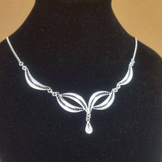 Filigree necklace, handmaded in Italy, weight: 5.5 gr Matchable with https://www.etsy.com/it/listing/527417796 All items are handmade and personally designed. Custom orders are welcome! Ornate Filigree Silver Bridal Necklace, Elegant Teardrop Sterling Silver Necklace, Handmade Silver Teardrop Necklaces, Handmade Silver Teardrop Necklace, Silver Filigree Bridal Necklace Gift, Silver Filigree Bridal Necklace As A Gift, Wedding Filigree Teardrop Necklace, Traditional Silver Teardrop Necklace, Ornate White Gold Necklace With Intricate Design