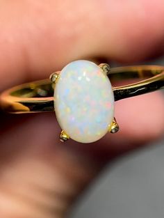 Australian opal set in gold plated 925 sterling silver ring Ring: made from gold plated 925 sterling silver Size 6.5 Stone: solid Australian opal mined from Coober Pedy 0.9 carats 8x6 mm Classic Ethiopian Opal Gemstone Rings, Classic Yellow Gold Opal Ring, Gold Ethiopian Opal Ring Hallmarked, Polished Yellow Gold Opal Ring, Gold Ethiopian Opal Ring For Anniversary, Classic Ethiopian Opal Ring As Gift, Gold Ethiopian Opal Ring Fine Jewelry, Gold Sterling Silver Opal Ring With Polished Finish, Yellow Gold Opal Ring Oval Cabochon For Gift