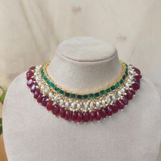 R O S H   J E W E L R Y Welcome to Rosh! Meet the perfect Choker, handmade and attentively created in India!    This is a versatile choker with adjustable length in universal combination of green red and pearls  Pair it up with your best ethnic outfit and spread magic! If you're a bride-to-be looking to add some very artistic and unique jewelry to your bridal couture, then we have got you covered, and how?! This necklace sits beautifully as a choker with intrinsic Kundan work completely handmade Meenakari Necklaces For Navratri Party, Meenakari Necklace For Navratri Party, Bollywood Choker Necklaces For Diwali, Temple Jewelry With Zari Work For Party, Bollywood Style Choker Necklaces For Diwali, Bollywood Style Choker Necklace For Diwali, Chandbali Necklaces For Eid Party, Heavy Necklaces For Navratri Party, Kundan Temple Jewelry Necklace For Parties And Festivals