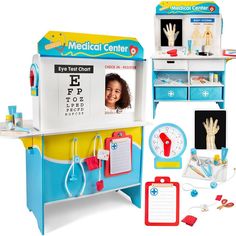 a child's medical center playset with toys and accessories on display for sale