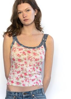 Add a pop of personality to your wardrobe with Pink Ditzy, the everyday tank that puts a fresh spin on a classic style. Perfect for any occasion, this tank is anything but ordinary! Fitted Casual Camisole For Daywear, Feminine Spring Camisole For Layering, Feminine Stretch Tank Top For Daywear, Casual Stretch Camisole For Daywear, Pink Stretch Tank Top For Everyday, Trendy Everyday Tank Camisole, Spring Everyday Camisole With Scoop Neck, Fitted Floral Print Tank Top For Day Out, Feminine Cotton Scoop Neck Top