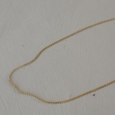 Description Dainty and elegant chain that makes the perfect addition to your layered necklaces. It has a wavy design to it. Material Stainless Steel base 18k PVD gold plating 16 in + 2 in extender How to care for your jewelry: Water resistant but always strongly recommend removing your jewelry before participating in any activities that can lead to contact with moisture or chemicals, such as washing your hands, sleeping in your jewelry, or showering, to maintain shine and ensure a long lifetime. 14k Gold Filled Chain Link Necklace With Adjustable Chain, 14k Gold-filled Oval Link Necklaces, Minimalist Curb Chain Necklace For Layering, Elegant 14k Gold-filled Oval Link Necklaces, Yellow Gold 14k Gold-filled Necklace With Adjustable Chain, Elegant 14k Gold Filled Oval Link Necklace, Dainty Curb Chain Jewelry For Layering, Delicate 14k Gold Curb Chain Jewelry, 14k Yellow Gold-filled Chain Necklace