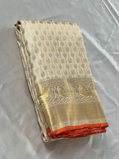 Bridal Collection White Color Pure Kanchipuram Silk Saree | Indian Traditional Ethnic Saree | Wedding or Party Wear Saree | Handwoven Gift Saree for Her Product Details : Saree Type : Pure Kanchipuram Silk Saree Golden Zari, Silk Mark Certified Blouse Piece : Yes (Un-Stitched) Saree Length : 5.5 Meters Blouse Piece Length : 80 cm Saree Weight : 0.9 kg Saree Fabric : Pure Kanchipuram Silk  Color : As shown in the picture Work : weaving Pattern : designer Occasion: Party Wear, Formal Wear, Festiva Traditional Pre-draped Cream Saree, Wedding Tussar Silk Pre-draped Saree For Festivals, Bollywood Style Off White Pre-draped Saree With Pallu, White Cutdana Pre-draped Saree For Puja, White Pre-draped Saree With Self Design, Off White Churidar With Cutdana In Traditional Drape, Off White Churidar With Cutdana, Elegant Zari Work Kurta For Puja, Traditional Drape Off White Churidar With Cutdana