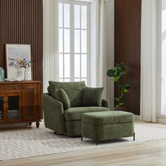 a living room with a chair and ottoman