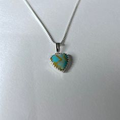 "* Heart shaped turquoise pendant necklace with matching earrings * All Components made from 925 sterling silver * necklace available in sizes 16\",18\" or 20\" * Handcrafted in the USA * Free Shipping * Item shipped in gift box * Item is made to order and cabochon may vary in color These beautiful heart shape pendant necklace and earrings are made entirely from sterling silver with a stunning turquoise cabochon. All jewelry are measured, soldered, and stone set all by hand using quality materia Sterling Silver Heart Beads Dangle Jewelry, Sterling Silver Teardrop Jewelry With Heart Charm, Teardrop Heart Charm Jewelry Gift, Artisan Turquoise Dangle Necklace Gift, Silver Heart Beads Teardrop Jewelry, Silver Teardrop Jewelry With Heart Beads, Sterling Silver Jewelry With Heart Charm In Green, Unique Blue Teardrop Turquoise Necklace, Turquoise Teardrop Pendant Jewelry