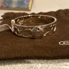 Brand New Silver Coach Bangle. Silver All Around. Button Closure Infinite Jewelry, Coach Bracelets, Baddie Jewelry, Coach Bangle, Bangle Silver, Coach Jewelry, Rose Gold Bangle, Rhinestone Bow, Toggle Bracelet