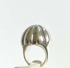 92.5 sterling silver with anti tarnish. UK Hallmark Ring sizes: M      (UK),  6 ¼ (US)  P  ¼  (UK),   7  3/4  (US) P  ½   (UK),  8  (US)  Total ring size measurement:  25 mm Width * 17.5 mm Depth/Height of stone sit on the finger Silver Weight : 8.7 grams Product-Code : SR-93-923-134 Luxury Silver Domed Ring, Silver Domed Ring Gift, Formal Sterling Silver Dome Ring, Modernist Silver Dome Ring Open Style, Unique Silver Hallmarked Dome Ring, Silver Dome Ring With Polished Finish, Modernist Sterling Silver Dome Ring As Gift, Modernist Silver Dome Ring As Gift, Modernist Silver Dome Ring For Gift