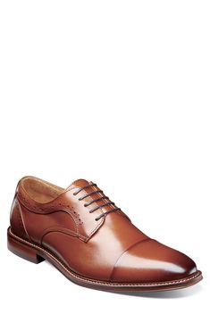 Broguing and burnished details accent a round cap toe lace-up that features anatomical arch support. Round cap toe Broguing details Lace-up Arch support removable insole Leather upper, manmade sole Imported Arch Support, Cognac, Derby, Men's Shoes, Leather Upper, Arch, Oxford, Size 7, Nordstrom