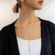 "Add a Touch of Elegance to Your Look with this Dainty Lariat Necklace - Featuring a Sliding Bead for adjusting the Closure Point on your Cleavage. ◾ This design has no closure part. It goes over your head while moving the sliding bead on the chain to open or close the circle. ◾ Length - The necklace length is 27\". The drop chain part is versatile according to where the sliding bead is placed on the chain. ◾ Material - Available in silver or gold Gold necklace - Gold Micron plating over sterlin Bohemian Lariat Necklace With Delicate Chain As Gift, Elegant Gold Necklace With Sliding Knot, Delicate Adjustable Necklaces For Layering, Lariat Necklace With Adjustable Length As Gift, Gift Lariat Necklace With Adjustable Length, Minimalist Adjustable Long Necklace For Gift, Minimalist Long Necklace As A Gift, Minimalist Adjustable Long Necklace As Gift, Adjustable Lariat Drop Necklace With Clavicle Chain