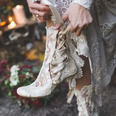 a close up of a person wearing white shoes