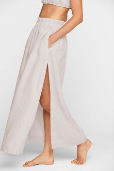 It takes two to Tambo. This crisp linen, floor-grazing maxi skirt with high slits is best worn with its matching crop top, the Matuku. We’re feeling this look for a balmy summer day adventuring on the coast or a vacation date night on the beach. Pro tip - breathable linens are ideal for a sticky subway ride in the middle of the summer. Night On The Beach, Soft Tailoring, Strap Crop Top, Pro Tip, It Takes Two, Summer Day, Dress Romper, The Coast, Skirts For Sale