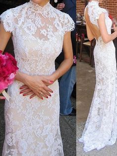 the woman is wearing a white dress and holding a bouquet