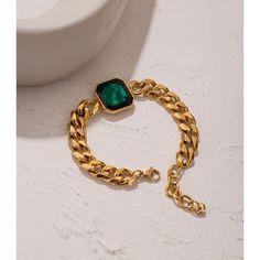 Luxurious green crystal chunky chain bracelet in golden metallic color. Add to any ensemble for a sophisticated and elegant look. Details Item Type: Fashion Bracelets Metal Type: Stainless Steel+Gold Plated Material: Crystal Length: 18.5+4.3cm Pendant Size: 21*21mm Bracelet Thick, Emerald Bracelet, Gems Bracelet, Red Gemstones, Hand Chain, Gold Bangle Bracelet, Luxury Collection, Gold Bracelet Chain, Gold Crystal