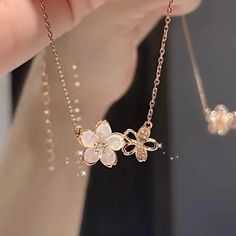 This Delicate Blossom Flower Pendant Gold 18k Filled Necklace Is A Beautiful Symbol Of Grace And Femininity. Featuring Two Intricately Designed Flowers, This Dainty Necklace Adds A Touch Of Elegance To Any Outfit. The Fine Silver-Tone Chain Is Lightweight And Comfortable, Making It Perfect For Everyday Wear Or As A Special Accent Piece For Formal Occasions. The Delicate Floral Design Brings A Fresh, Natural Charm, Making This Necklace A Wonderful Gift Or A Timeless Addition To Your Jewelry Colle Girly Necklace Aesthetic, Pearl Flower Jewelry, Simple Gold Necklace Designs, Modest Jewelry, Girly Necklace, Simple Gold Jewelry, Simplistic Jewelry, Gold Jewelry Prom