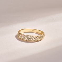 Minimalist Pave Dome Wedding Ring 14k 10k 18k Solid Gold with Micro Pave Real Natural Diamond High Dome Statement Ring is available in Yellow White Rose Gold. Elevate your style with the allure of understated luxury. Get this ring today and experience the beauty and versatility of a piece that effortlessly enhances your presence.  Ring Details  ❥ Gold KT: 14k Solid Gold (also in 10, 18K)  ❥ Gold Color Options: White, Yellow, Rose Gold  ❥ Band Width: 2.45 mm  ❥ Thickness: 1.50 mm  ❥ Top Width: 4.35 mm  ❥ Gemstone: D Color Moissanite Customization is Available on This Design!  We are more than happy to accommodate any customization requests, ensuring that your ring truly reflects your unique taste. With our vast range of options, including Rose Gold, Yellow Gold, and White Gold, you can choo Stackable Round Cut Moissanite Diamond Ring, Stackable Moissanite Diamond Ring Round Cut, Fine Jewelry Stackable Cluster Ring, Moissanite Stackable Diamond Ring In Fine Jewelry Style, Gold Crystal Ring With Round Cut In Minimalist Style, Gold Cubic Zirconia Stackable Wedding Rings, 14k Gold Half Eternity Diamond Promise Ring, Gold Cubic Zirconia Stackable Rings For Wedding, Gold Moissanite Stackable Wedding Rings