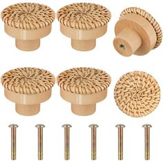 four wooden knobs and two screws with wood handles, all in the same pattern