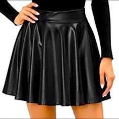 Shiny A-Line Pleated Skirt. Stretchy Material. Black Pleated Mini Skirt For Date Night, Black Full Mini Skirt For Fall, Black Skirted Skort For Fall, Flared Mini Skirt For Night Out, Edgy Stretch Skirt For Date Night, Black Stretch Skirt For Fall, Casual Flared Mini Skirt For Party, Stretch Black Skirt For Fall, Fall Party Flared Skort