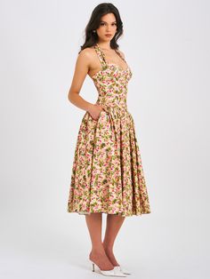 Behold our Niya maxi dress, a stunning union of style and ease. Delicately crafted from a charming floral print fabric, it exudes feminine allure with every step. The drop waist design imparts a contemporary silhouette, while padded cups ensure a flattering fit. Practicality meets elegance with convenient pockets discreetly integrated into the design. Structured with built-in bones and hard mesh supporting the hemline, it promises both form and function. Seamlessly finished with an invisible zip Halter Corset, Corset Maxi Dress, Satin Corset Dress, Jumpsuit And Blazer, Floral Print Fabric, Satin Gown, Invisible Zip, Printed Linen, Blazer Dress