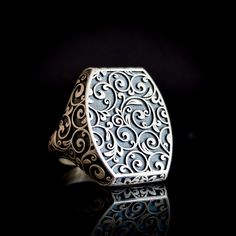 Introducing our elegant large silver ring, crafted with great skill and precision in 925 sterling silver. Its oval shape elegantly adorns your finger, while its intricate carved floral patterns enchant with vintage inspirations. This artisanal masterpiece has exceptional ergonomics, ensuring a comfortable fit for everyday wear. Being stone-free allows the focus to be on the meticulous craftsmanship and the timeless elegance of the piece. Elevate your style with this one-of-a-kind ring with a uni Luxury Silver Engraved Filigree Ring, Luxury Silver Rings With Classic Design, Luxury Engraved Silver Filigree Ring, Luxury Oval Signet Ring With Intricate Design, Luxury Silver Open Signet Ring, Luxury Silver Filigree Ring In Sterling Silver, Luxury Silver Hallmarked Filigree Ring, Classic Silver Filigree Ring With Polished Finish, Luxury Silver Oval Engraved Ring