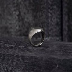 The exquisite Black Diamond Oval Signet Ring, a modern take on a classic style. Crafted from high-quality Sterling Silver, this ring features a unique reworked design that is sure to catch the eye. Adorned with four stunning black diamonds, each measuring 2mm and set on the side as the cardinal points, this ring strikes the perfect balance between elegance and edginess. Sterling silver 925 Signet Ring style Black diamonds 4 pieces, 2mm Ring Face: 20mm by 15mm Thickness: 1-2mm Made in NYC Cardinal Points, Cardinal Point, Oval Signet Ring, Edgy Elegance, Instagram Jewelry, Black Diamonds, Ring Style, Oval Diamond, Ring Sterling Silver